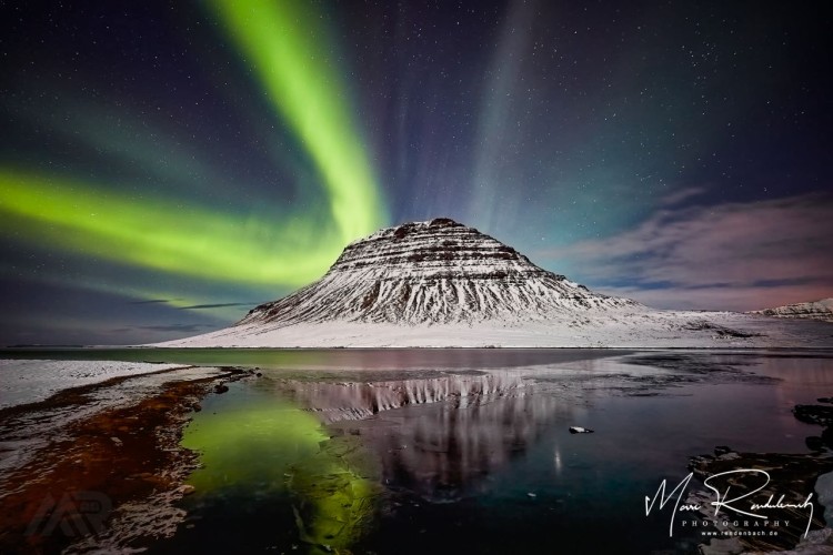Northern Lights Aurora Borealis at Kirkjufell Mountain Iceland