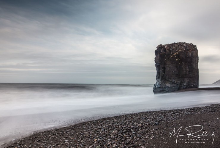 A rock in the surf