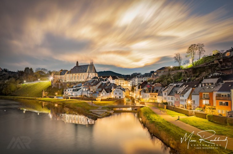 Saarburg mouth of the Leuk into the Saar with Laurentius Church Germany